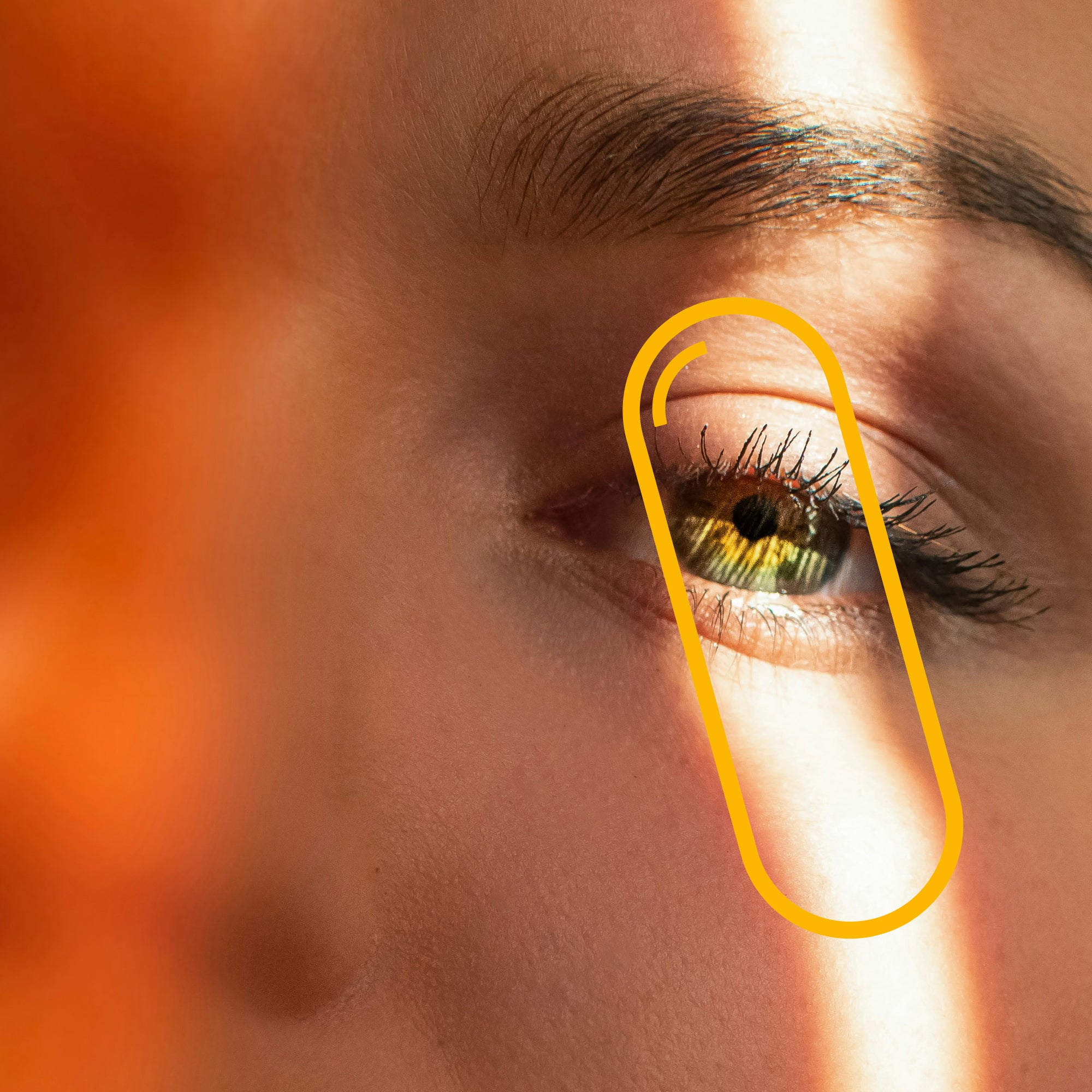 A detailed view of an eye illuminated by sunlight, highlighting Vitamin D3’s role in helping to improve mood and overall well-being.